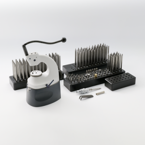 STAR Staking tool and friction jewelling outfit, with 104 punches, 12 pushers and 25 stakes, with base, in a case